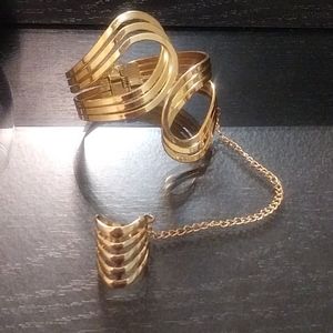 Gold-plated bracelet with connected ring
